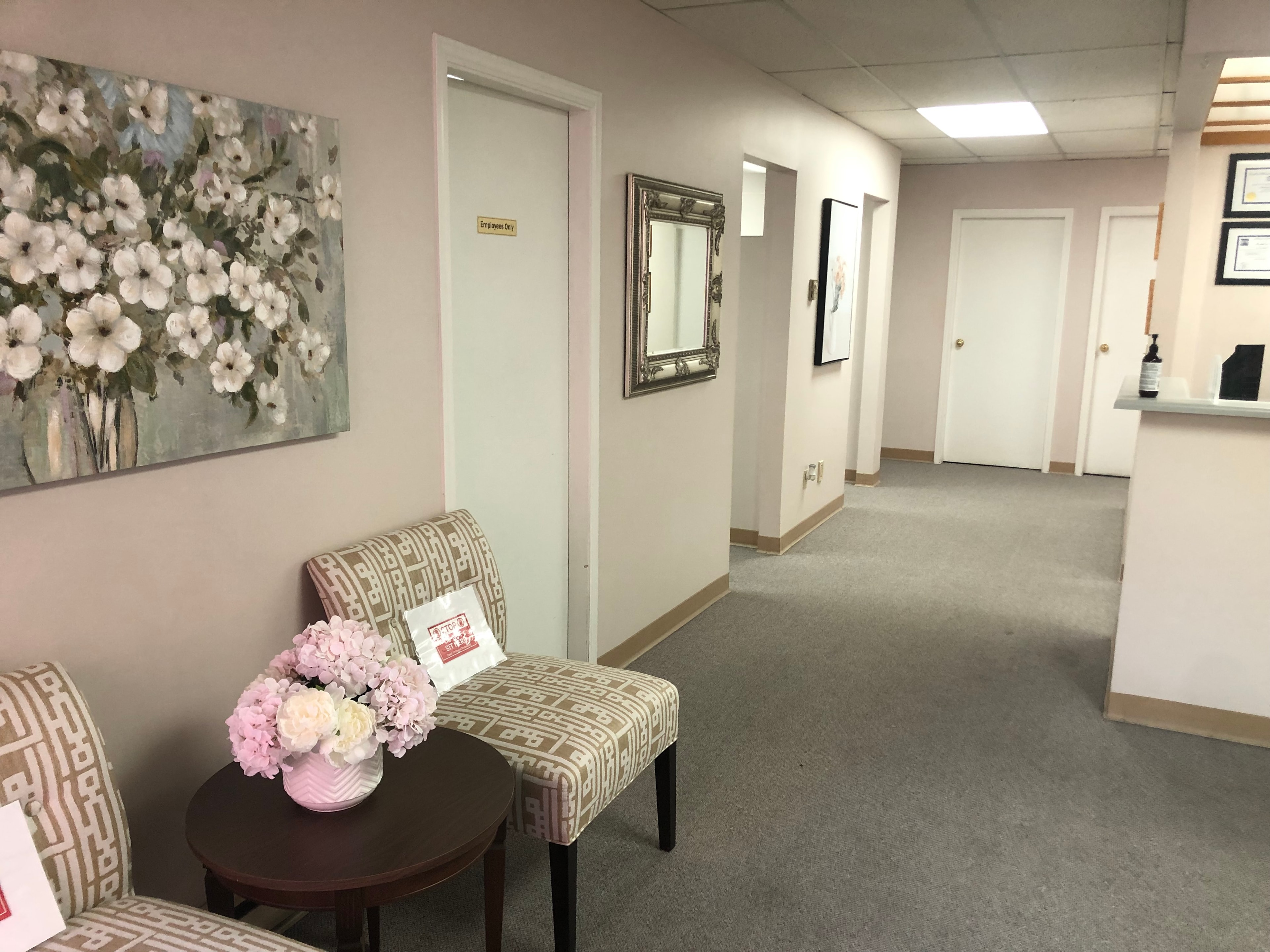 Denturist consulting with a patient at Art Smile Denture Clinic
